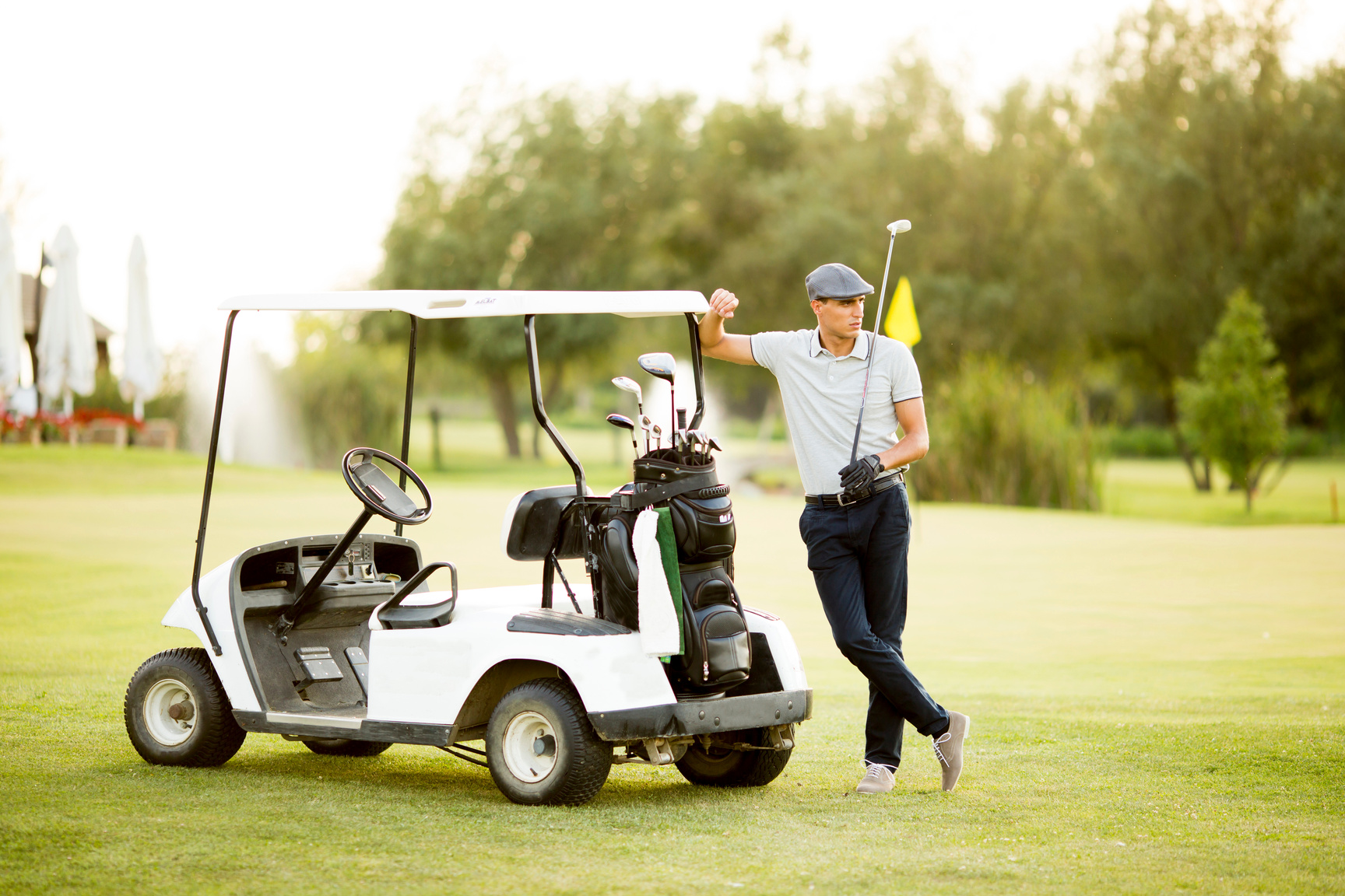 Young Couple at Golf Cart